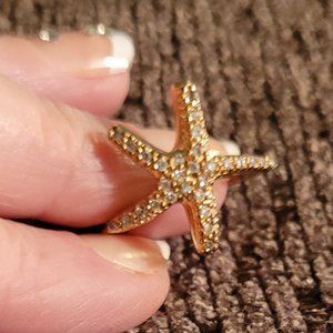 Gold toned Starfish ring with tiny sparkly stones